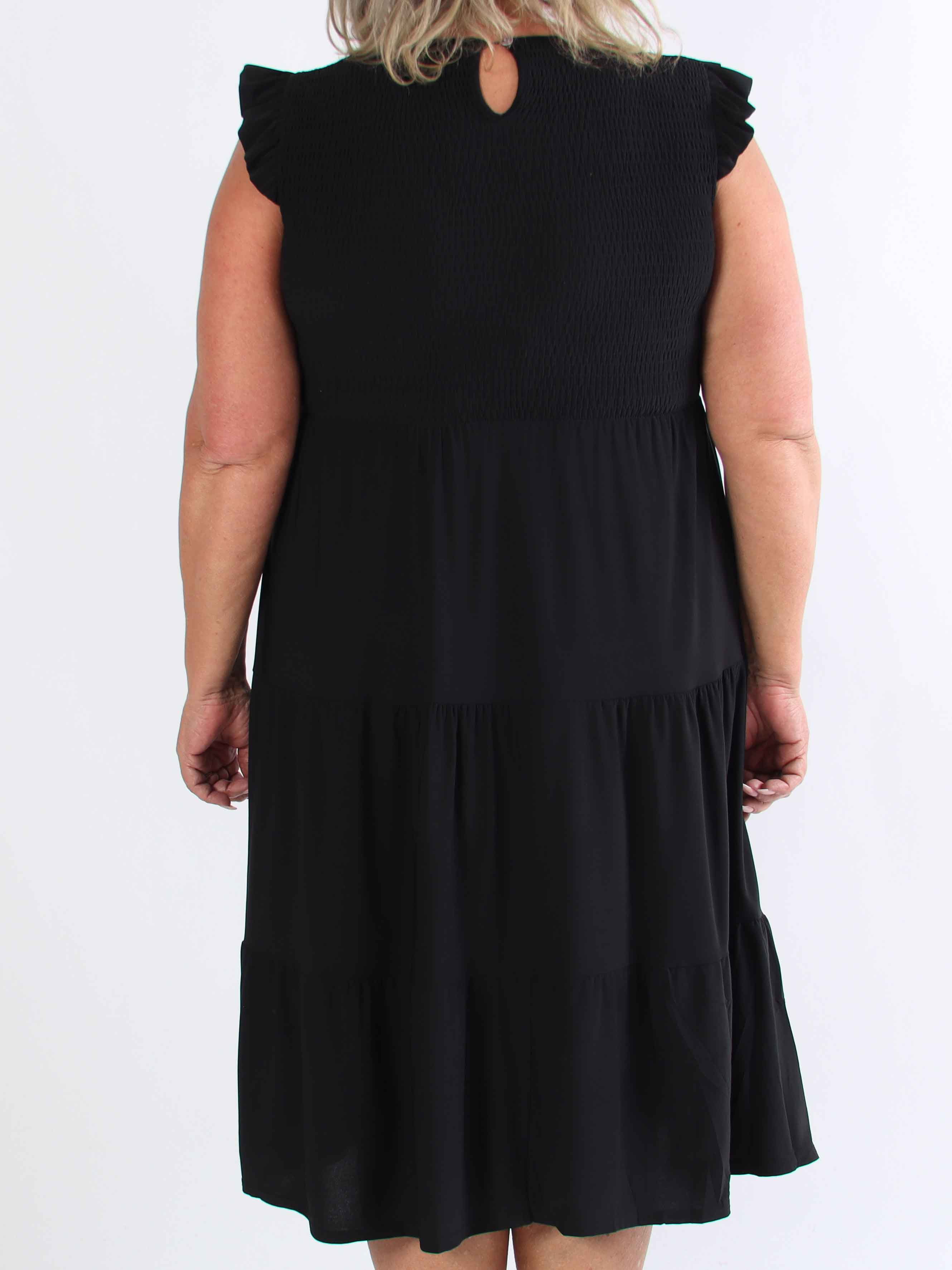 Kelly Sleeveless - Elastisk plus size-klänning med smockat bröst